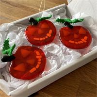 three glass halloween pumpkins