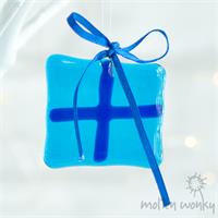 turquoise fused glass present 