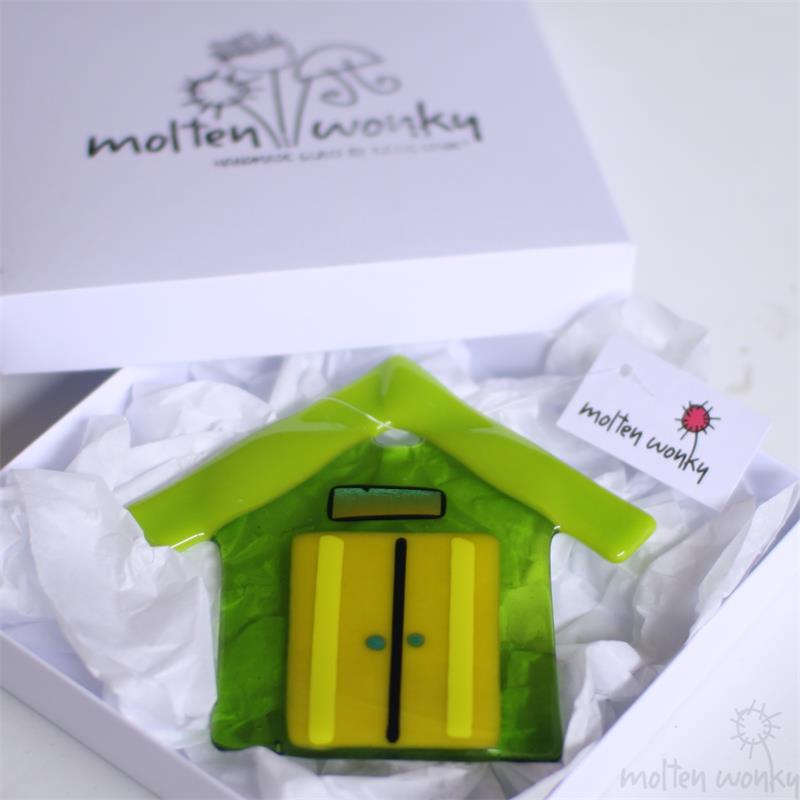 handmade colourful glass beach hut by molten wonky