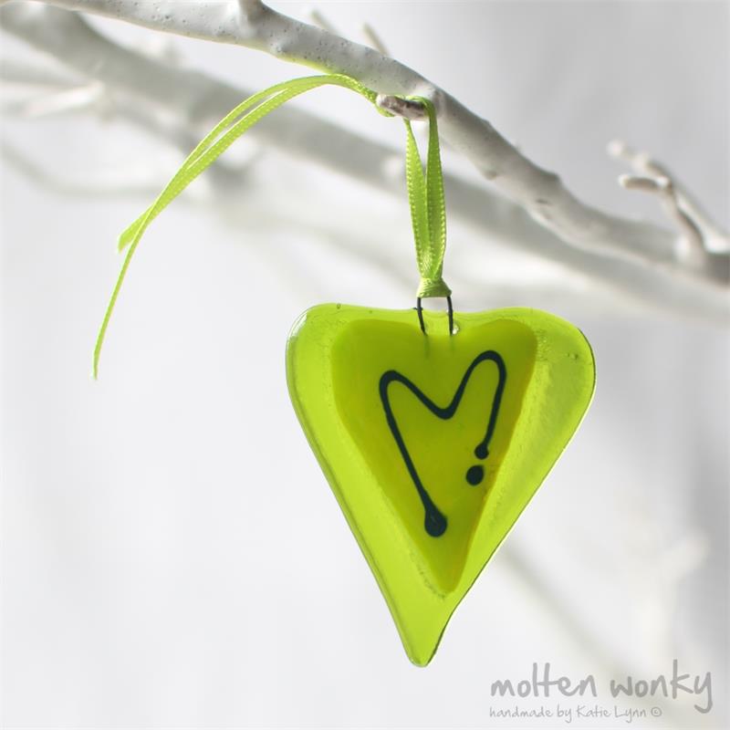 little green fused glass love heart hanging decoration made by molten wonky