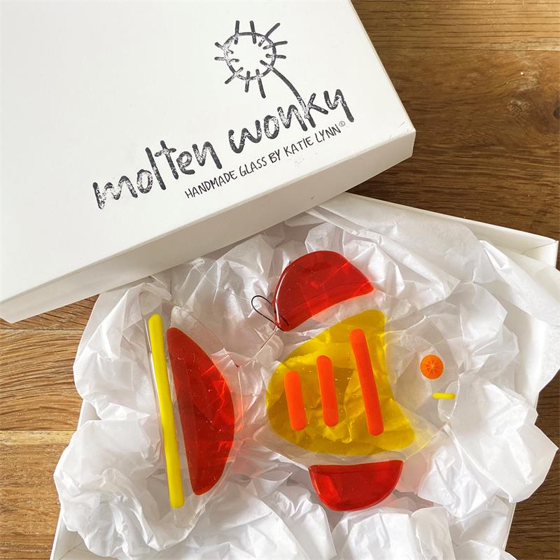 orange and yellow fused glass fish decoration 