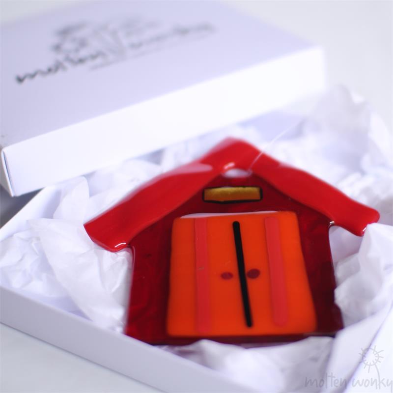red fused glass beach hut