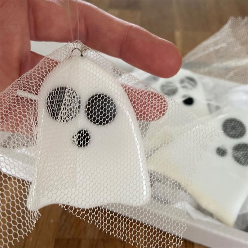 three fused glass ghosts